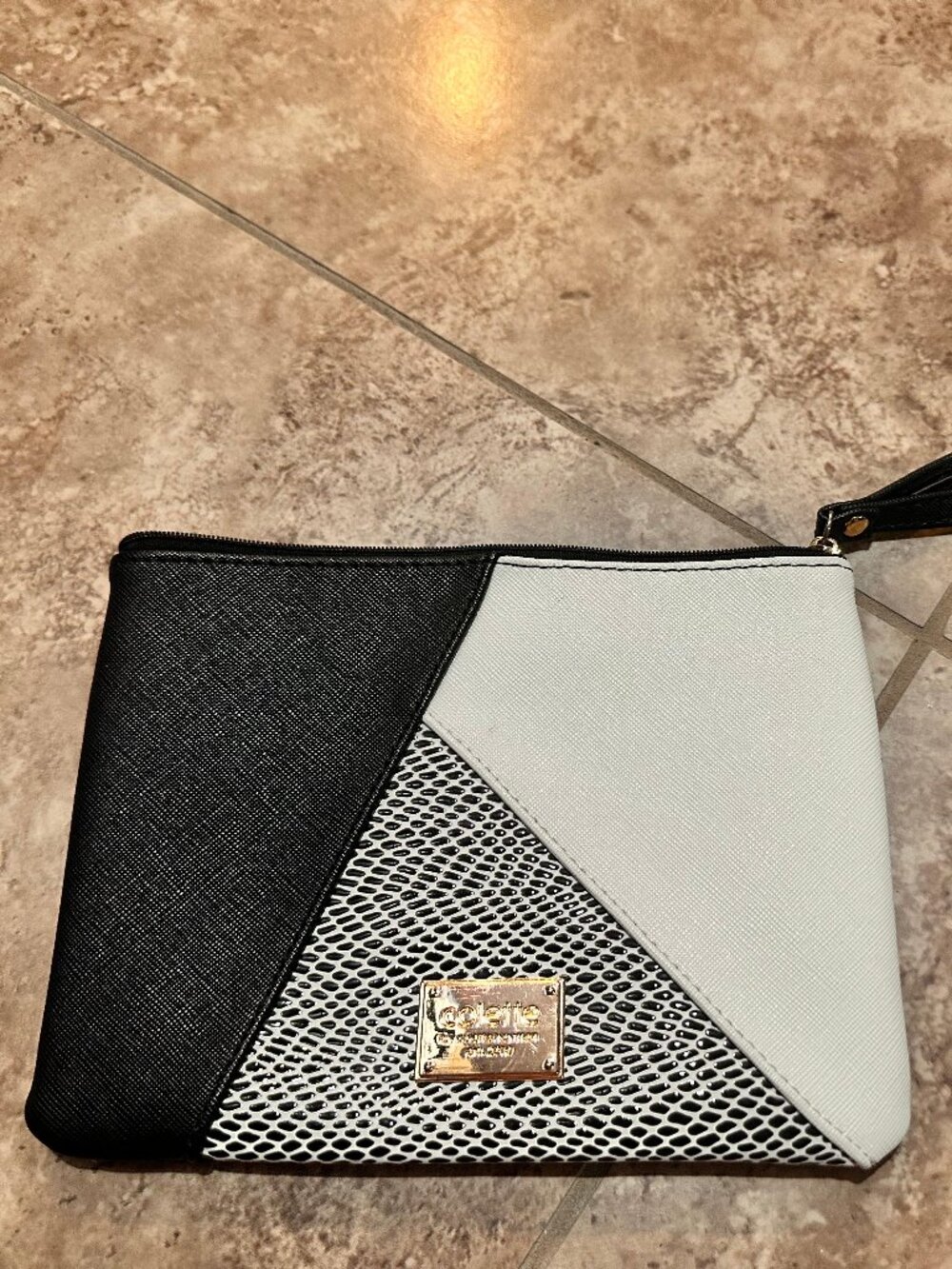 Black & White Color-blocked Patchwork Clutch bag designed by Colette Hayman